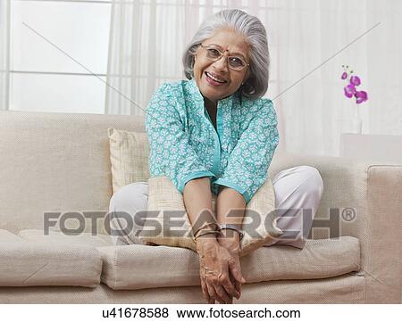 Stock Photo - Portrait of an old woman. Fotosearch