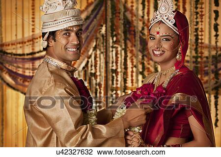 Portrait of Bengali groom and bride View Large Photo Image Stock Image - Portrait of Bengali groom and bride . Fotosearch