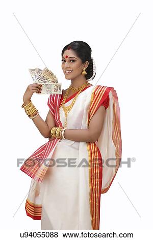 Stock Photo - Portrait of Bengali woman holding currency notes . Fotosearch