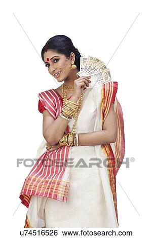Portrait of Bengali woman holding currency View Large Photo Image Stock Photograph - Portrait of Bengali woman holding currency. Fotosearch