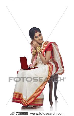 Portrait of Bengali woman wearing jewelery View Large Photo Image Stock Photo - Portrait of Bengali woman wearing jewelery. Fotosearch