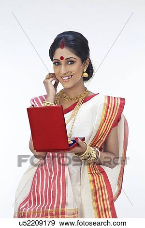 Stock Photo - Portrait of Bengali woman with a jewelery box. Fotosearch