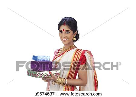 Portrait of Bengali woman with gifts View Large Photo Image Stock Image - Portrait of Bengali woman with gifts . Fotosearch