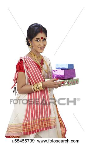 Portrait of Bengali woman with gifts View Large Photo Image Stock Photo - Portrait of Bengali woman with gifts. Fotosearch