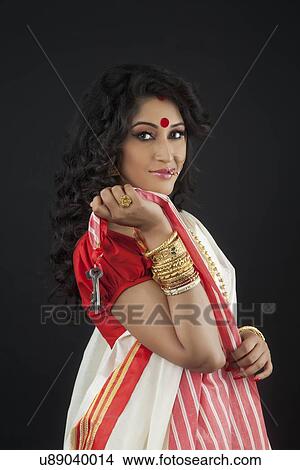 Picture - Portrait of Bengali woman with keys. Fotosearch