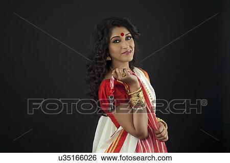 Portrait of Bengali woman with keys View Large Photo Image Stock Photograph - Portrait of Bengali woman with keys. Fotosearch