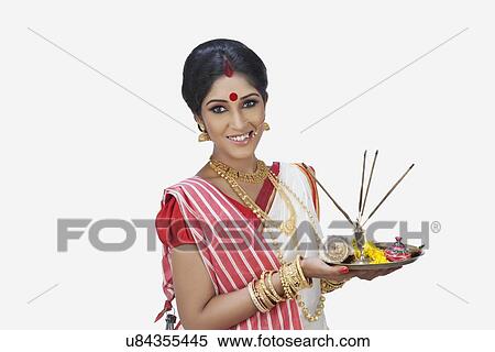 Portrait of Bengali woman with puja thali View Large Photo Image Stock Photography - Portrait of Bengali woman with puja thali. Fotosearch