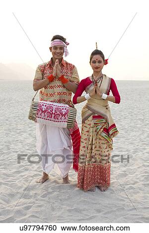 Stock Image - Portrait of Bihu dancers greeting . Fotosearch