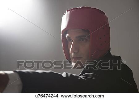 Portrait of businessman with protective headgear View Large Photo Image Picture - Portrait of businessman with protective headgear . Fotosearch