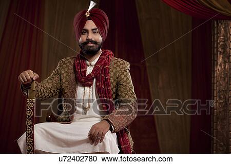 Portrait of charming man smiling View Large Photo Image Stock Image - Portrait of charming man smiling . Fotosearch