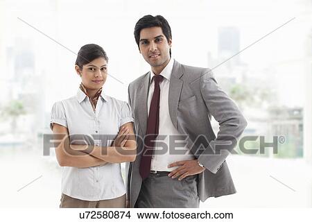 Portrait of confident business colleagues smiling together View Large Photo Image Picture - Portrait of confident business colleagues smiling together . Fotosearch