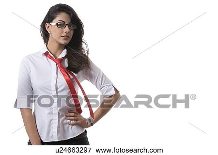 Portrait of confident stylish businesswoman wearing glasses over white background View Large Photo Image Stock Photo - Portrait of confident stylish businesswoman wearing glasses over white background. Fotosearch
