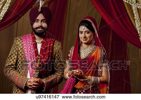 Portrait of couple on their wedding day View Large Photo Image Stock Photo - Portrait of couple on their wedding day . Fotosearch