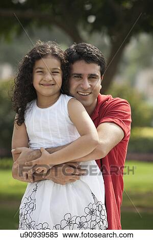 Stock Photography - Portrait of father and daughter . Fotosearch