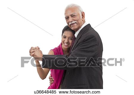 Stock Photography - Portrait of granddaughter and grandfather. Fotosearch