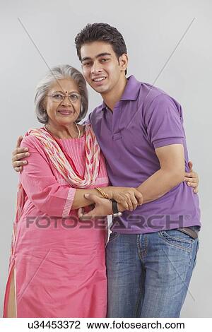Stock Image - Portrait of Grandmother and grandson. Fotosearch