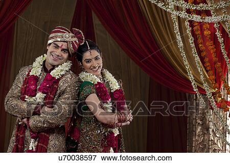 Portrait of happy young couple smiling together View Large Photo Image Stock Photo - Portrait of happy young couple smiling together . Fotosearch