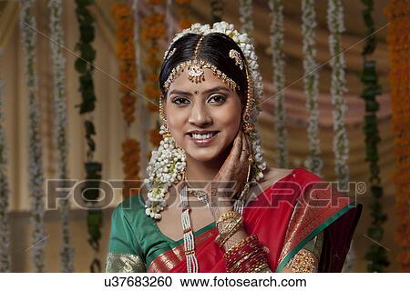 Portrait of happy young woman on her wedding day View Large Photo Image Stock Image - Portrait of happy young woman on her wedding day . Fotosearch