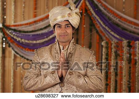 Portrait of Indian groom greeting View Large Photo Image Stock Photo - Portrait of Indian groom greeting . Fotosearch