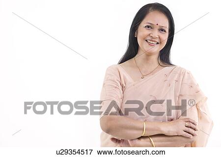 Portrait of mature woman wearing sari View Large Photo Image Stock Photo - Portrait of mature woman wearing sari . Fotosearch