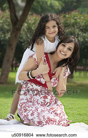 Picture - Portrait of mother and daughter . Fotosearch
