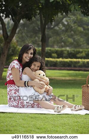 Portrait of mother and daughter View Large Photo Image Stock Photo - Portrait of mother and daughter . Fotosearch
