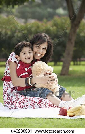 Stock Image - Portrait of mother and son . Fotosearch