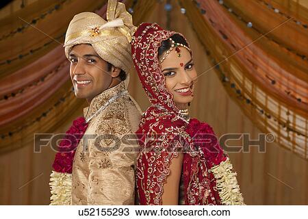 Stock Image - Portrait of newly married Indian couple . Fotosearch