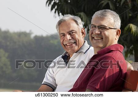 Portrait of old men in a park View Large Photo Image Stock Image - Portrait of old men in a park . Fotosearch