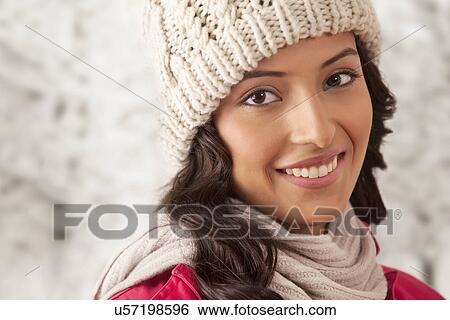 Portrait of smiling young woman View Large Photo Image Stock Photograph - Portrait of smiling young woman . Fotosearch