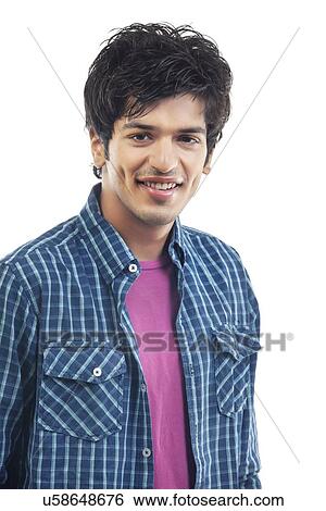 Portrait of stylish young man smiling over white background View Large Photo Image Stock Photograph - Portrait of stylish young man smiling over white background . Fotosearch
