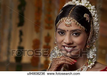 Portrait of traditional Indian woman smiling View Large Photo Image Stock Photograph - Portrait of traditional Indian woman smiling . Fotosearch