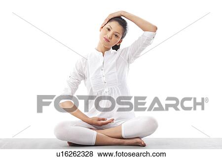 Portrait of woman practicing yoga View Large Photo Image Stock Photo - Portrait of woman practicing yoga . Fotosearch