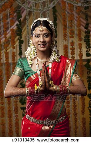 Portrait of woman with hands clasped View Large Photo Image Stock Photography - Portrait of woman with hands clasped . Fotosearch