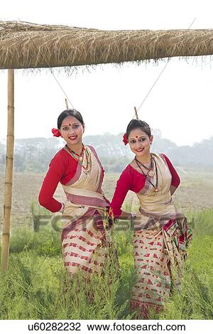 Portrait of women performing Bihu dance View Large Photo Image Stock Image - Portrait of women performing Bihu dance . Fotosearch
