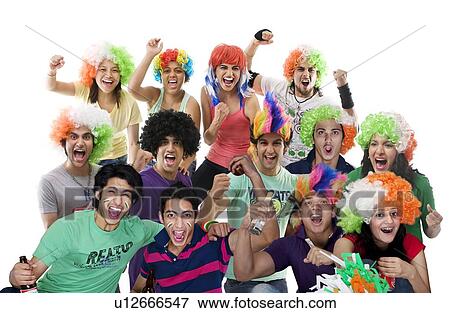 Portrait of youngsters with wigs cheering View Large Photo Image Stock Photo - Portrait of youngsters with wigs cheering . Fotosearch