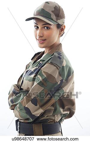 Profile view of female soldier against white background View Large Photo Image Stock Photo - Profile view of female soldier against white background . Fotosearch