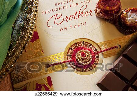 Stock Photo - Rakhi and greeting card . Fotosearch