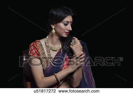 Side profile of a beautiful bride with jewelery View Large Photo Image Stock Image - Side profile of a beautiful bride with jewelery. Fotosearch