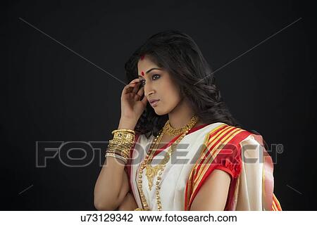 Stock Image - Side profile of Bengali woman. Fotosearch