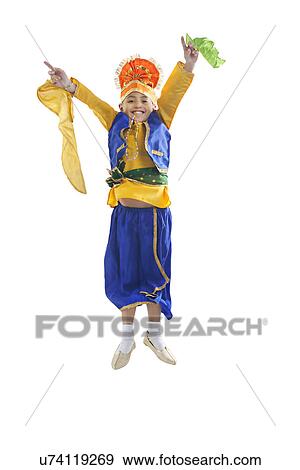 Sikh boy jumping in the air View Large Photo Image Stock Photo - Sikh boy jumping in the air . Fotosearch