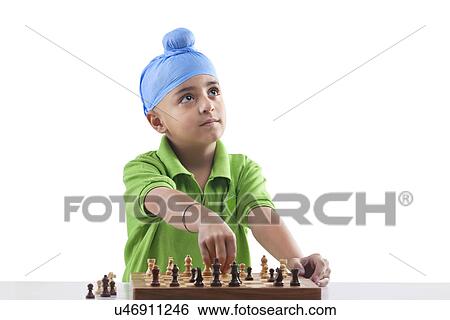 Sikh boy playing chess View Large Photo Image Stock Photograph - Sikh boy playing chess . Fotosearch