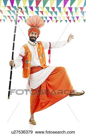 Sikh man posing with Khundis View Large Photo Image Stock Photo - Sikh man posing with Khundis . Fotosearch