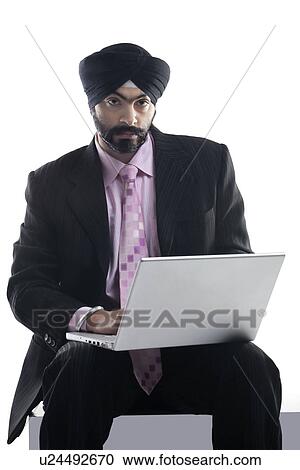 Sikh man with a laptop View Large Photo Image Stock Image - Sikh man with a laptop . Fotosearch