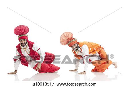 Stock Photo - Sikh men dancing . Fotosearch