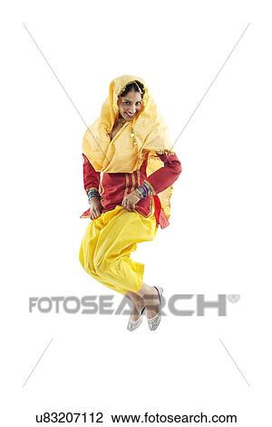 Sikh woman jumping in the air View Large Photo Image Stock Image - Sikh woman jumping in the air . Fotosearch