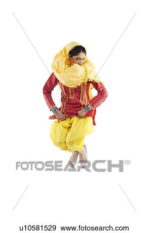 Sikh woman jumping in the air View Large Photo Image Stock Photo - Sikh woman jumping in the air . Fotosearch