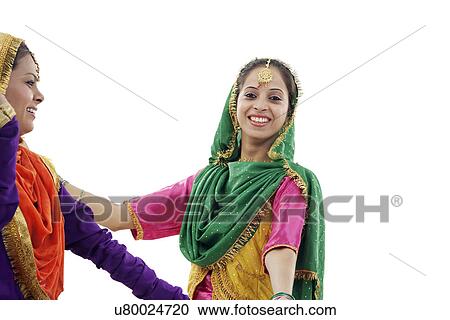 Sikh women dancing View Large Photo Image Stock Image - Sikh women dancing . Fotosearch