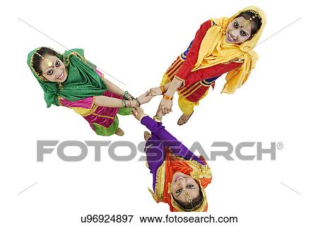 Stock Photo - Sikh women dancing . Fotosearch