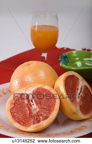 Sliced oranges with juice View Large Photo Image Stock Image - Sliced oranges with juice . Fotosearch